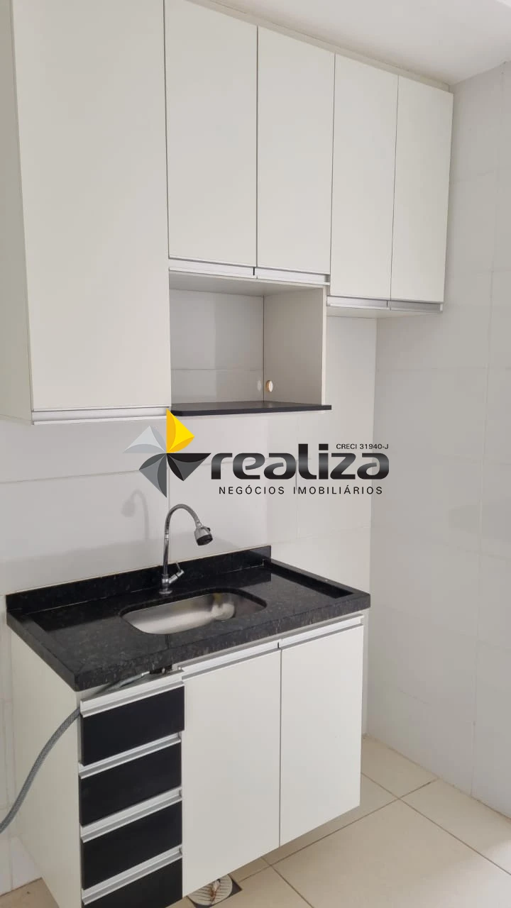Kitnet com planejados na cozinha