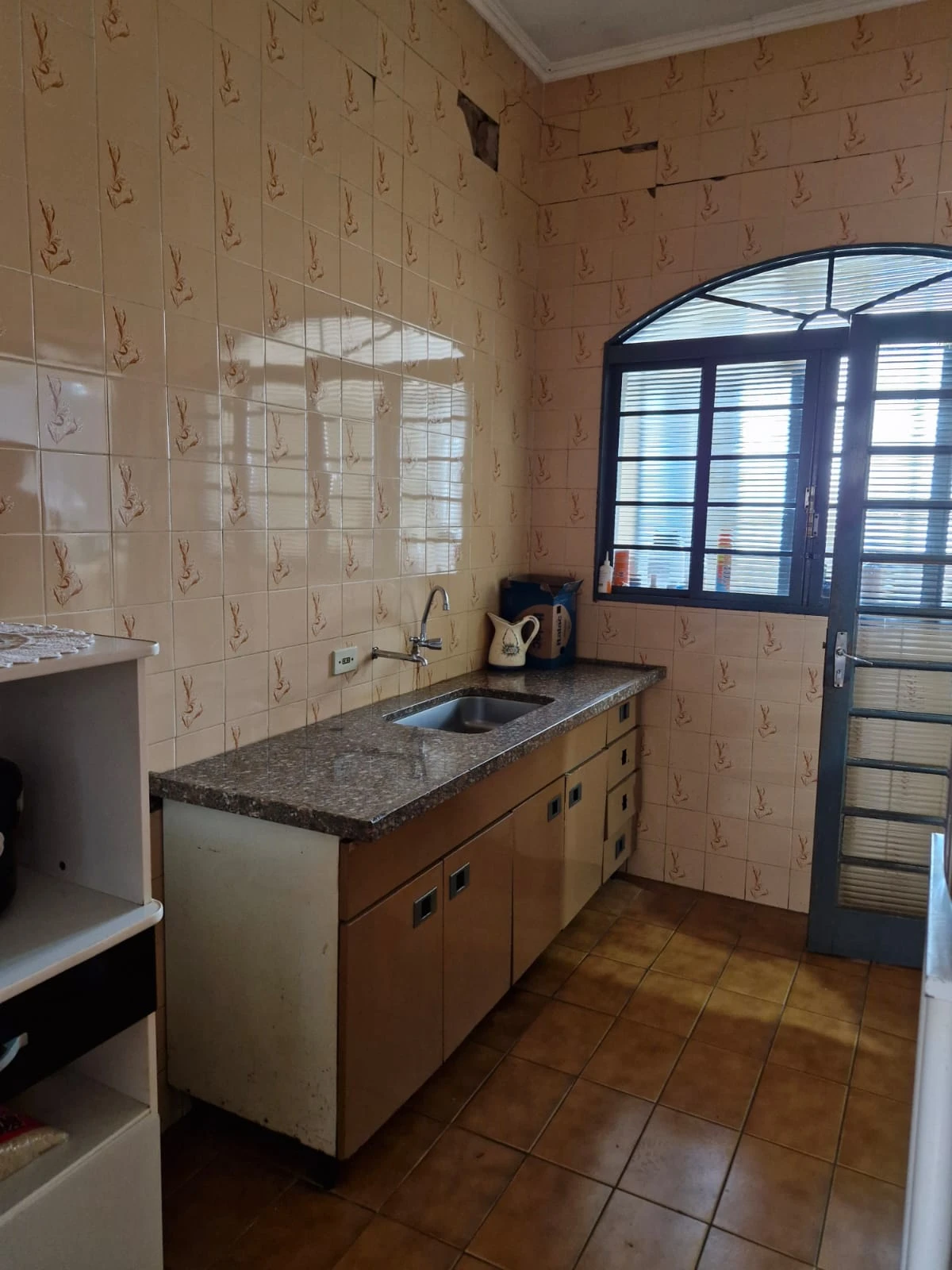 Casa com 3 dormitórios e casa nos fundos