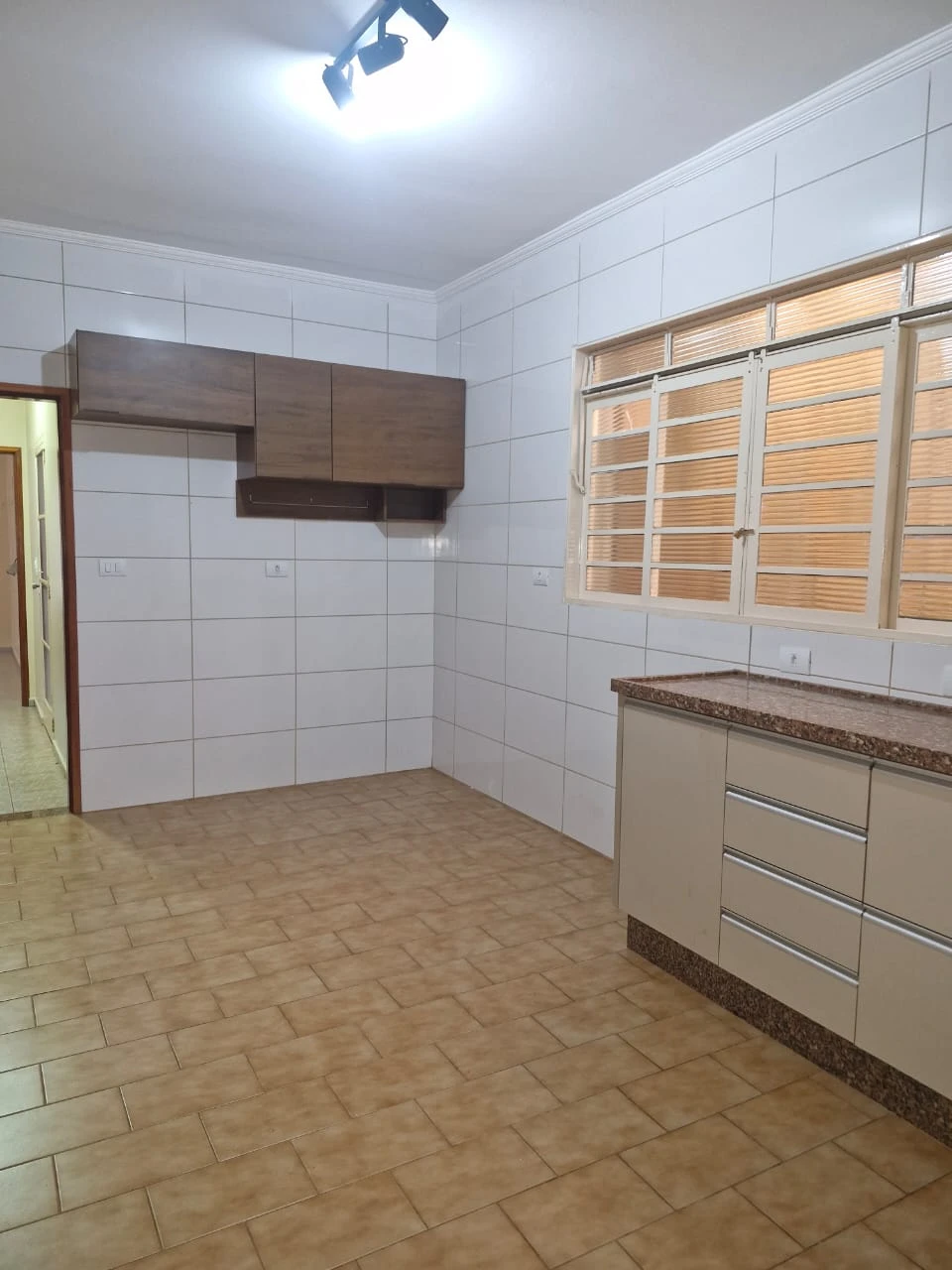 Casa com 3 dormitórios (sendo 1 suíte)