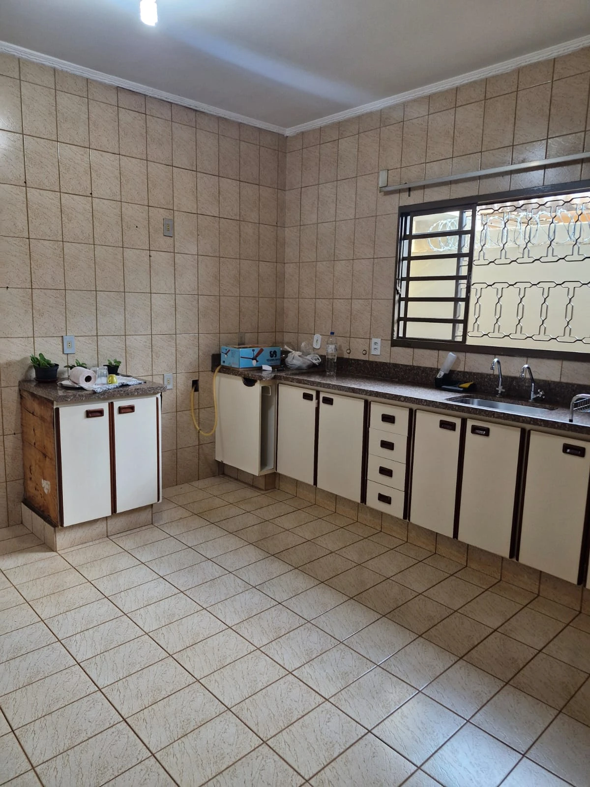 Casa com 3 dormitórios (sendo 1 suíte) e móveis planejados